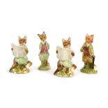 Four Royal Albert Beatrix Potter figures: Foxy Whiskered Gentleman, Mr Tod, two Foxy Reading, max h.
