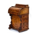 A Victorian burr walnut, strung and marquetry davenport,