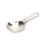 A silver caddy spoon with stepped handle, Georg Jensen, import marks, l.