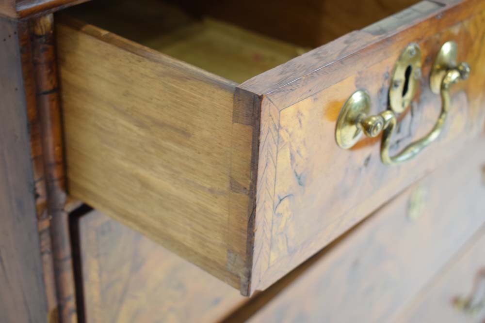 A Georgian walnut and feather crossbanded chest of three short over three long drawers on later bun - Image 4 of 27