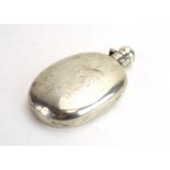 An Edwardian silver hip flask of oval form with bayonet fitting, SI Ltd., Chester 1900, l. 12 cm, 3.