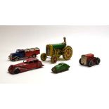 A mixed group of tinplate toys including a Mettoy tractor,