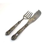 A pair of early 20th century silver plated fish servers of typical form (2) CONDITION