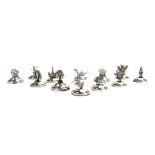 A set of twelve metalware place card/menu holders, each decorated with a Far Eastern animal,