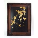 A pair of early 20th century Japanese lacquered, bone and mother of pearl inlaid panels,