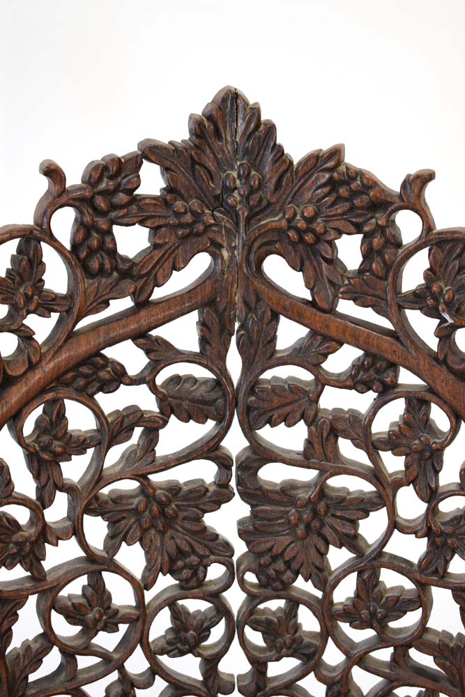 An Anglo-Indian fretwork hall chair intricately carved with fruiting vines, - Image 4 of 5