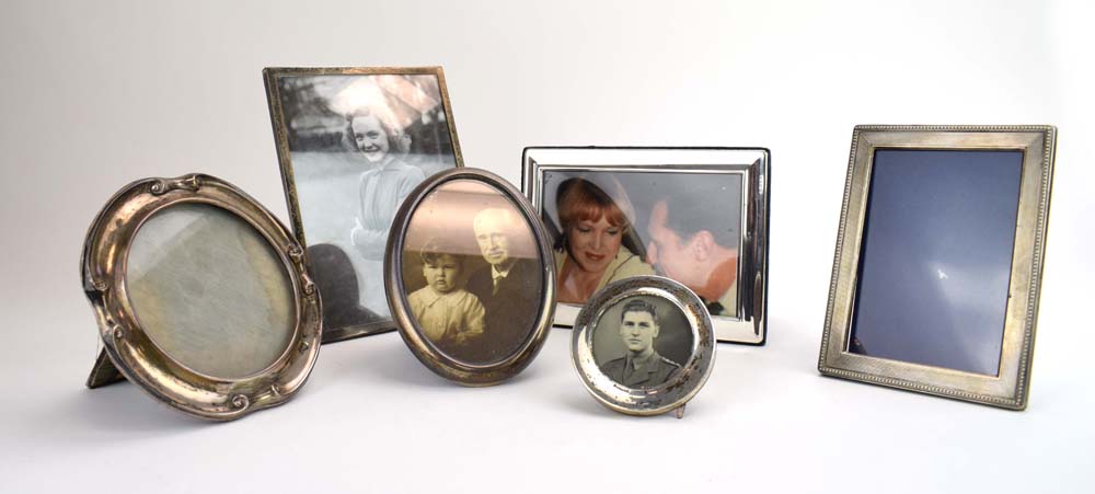 Six early 20th century and later silver mounted photograph frames, max h. 20.