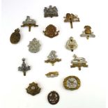 A group of fifteen county cap badges mainly from the North of England including Lancashire,