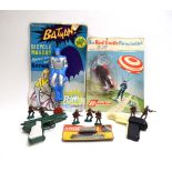 A mixed group of toys comprising a Selcol Fairchild moulded plastic Batman bicycle mascot,