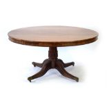 A 19th century mahogany dining table,