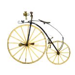An 1869 century velocipede or 'bone shaker' cycle with rosewood and brass grips,