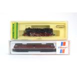 Two N gauge engines: Roco 23271 diesel loco and Minitrix 12053 2-10-2 tank loco,