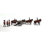 A group of Britains and other cast metal figures including mounted soldiers,