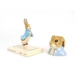 Two Beswick Beatrix Potter figures: Peter on His Book and Peter Rabbit, max h. 12.