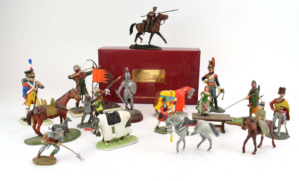 A group of painted metal figures modelled as Edwardian ladies, an archer, jousting figures,