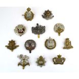 A group of twelve county cap badges from the South-West including Dorset, Gloucester, Cheshire,