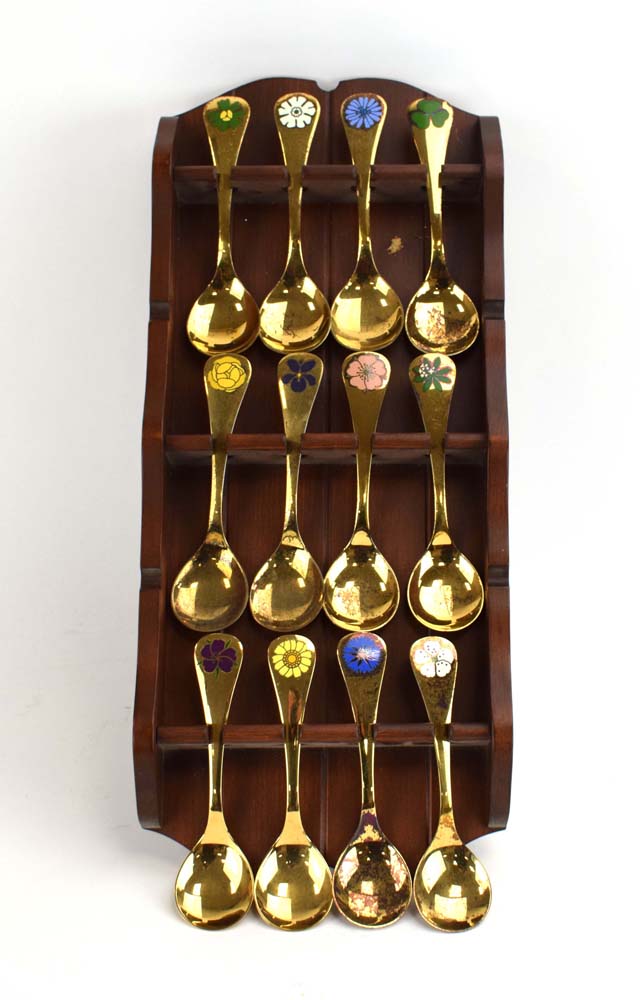 A set of twelve silver gilt and enamelled Christmas spoons,
