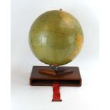 A George Philip & Son 1961 'Challenge Globe' on a teak base, overall h.