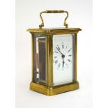 A late 19th 20th century carriage timepiece in a brass and five-glass case, h. 16 cm incl.
