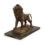 An early 20th century gilt spelter figure modelled as a roaring lion, on a marble plinth, w.