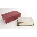 A silver bark design cigarette box of rectangular form on four stepped feet, maker H Bros.