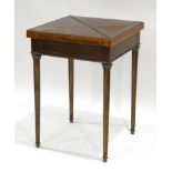 A mahogany and brass mounted envelope games table,