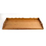 A late 19th/early 20th century Swedish pine butler's tray, w.