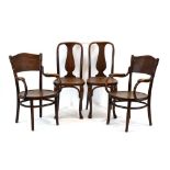 A pair of Czech bentwood armchairs with pressed seats by Thonet,