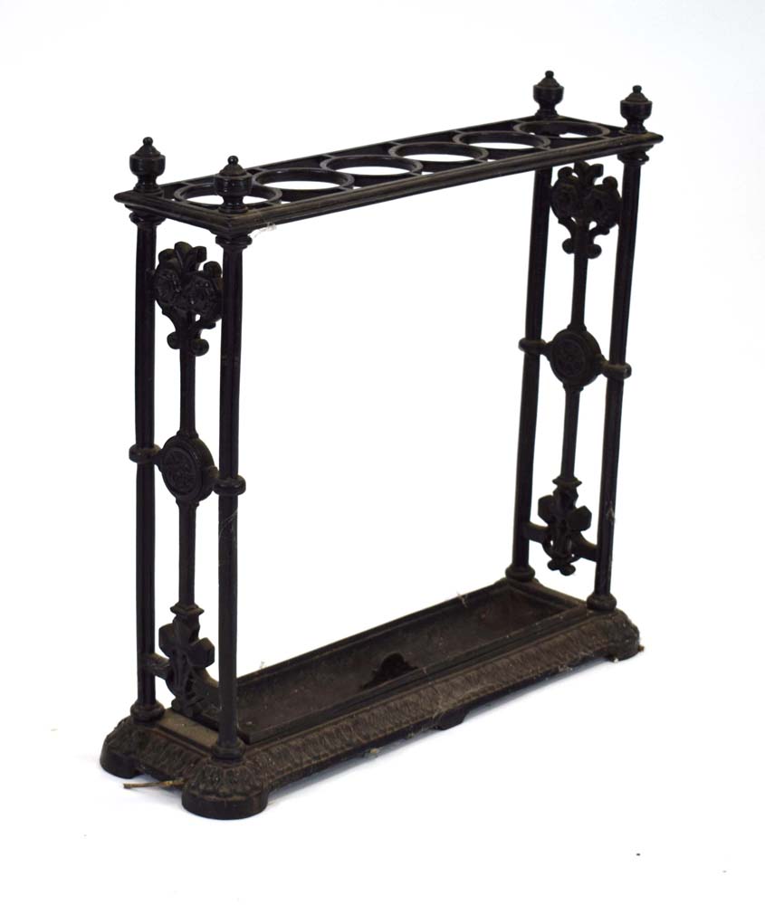 A Victorian black cast metal umbrella and stick stand in the manner of Coalbrookdale