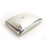 A silver cigarette case of cushioned rectangular form, SB & S Ltd., Birmingham 1930, w.