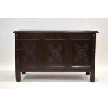 A late 17th/early 18th century and later carved oak coffer,