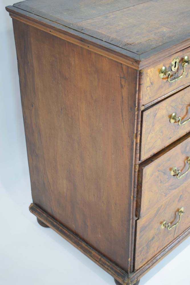 A Georgian walnut and feather crossbanded chest of three short over three long drawers on later bun - Image 3 of 27