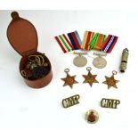 A Second World War group of medals including Defence & War, 1939-1945, Italy & Africa Stars,