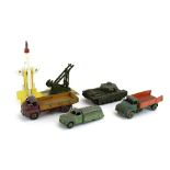 A group of Dinky and other loose commercial and military models including tanks, buses,