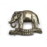 A 19th Hussars cap badge