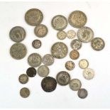 A small group of mainly silver coinage including a 1591 hammered shilling, 1920's florins etc.