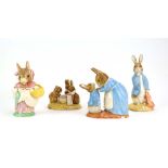 Four larger scale Beswick Beatrix Potter figures: Peter and the Red Pocket Handkerchief,