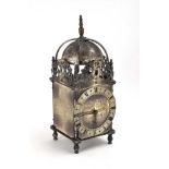 A reproduction 18th century-style lantern clock with a French movement and a silvered case, h.