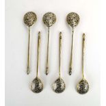 A set of three Russian silver, parcel gilt and niellowork enamelled spoons, maker HA/BC,