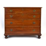 A 19th century mahogany chest of four long graduated drawers on bun feet, w.