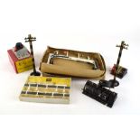 A quantity of Trix Twin and other OO gauge accessories including signals, switches, signs,