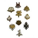 A group of ten county cap badges from the East of England including Norfolk, Suffolk, Kent,