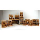 A group of Schleich plastic Wild West models including a totem pole,