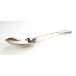 A Victorian silver fiddle pattern gravy spoon, maker Francis Higgins III, London 1892, l. 30.