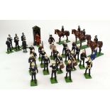 A Britain's 43059 mounted Policeman, boxed, together with nine further police figures, Beefeaters,