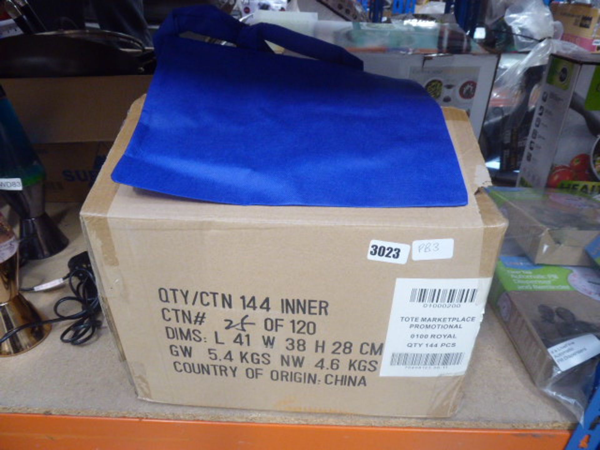 Box containing a quantity of blue tote bags