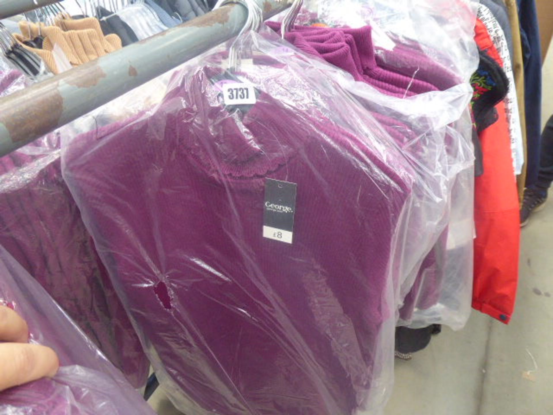 A quantity of children's 11-12 years purple crew neck jumpers