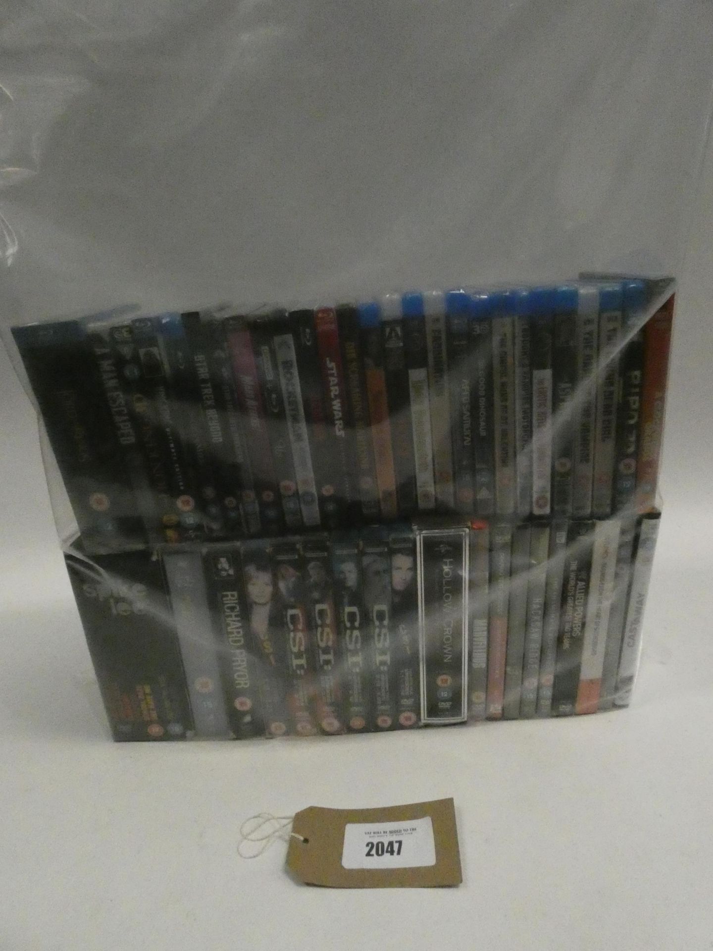 Bag containing quantity of DVD and Blu-Ray films/boxsets