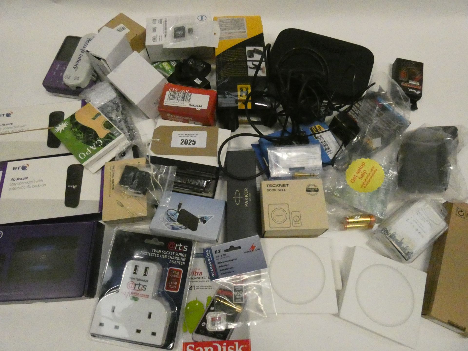 Bag containing quantity of various electrical related accessories/devices; routers, chargers,