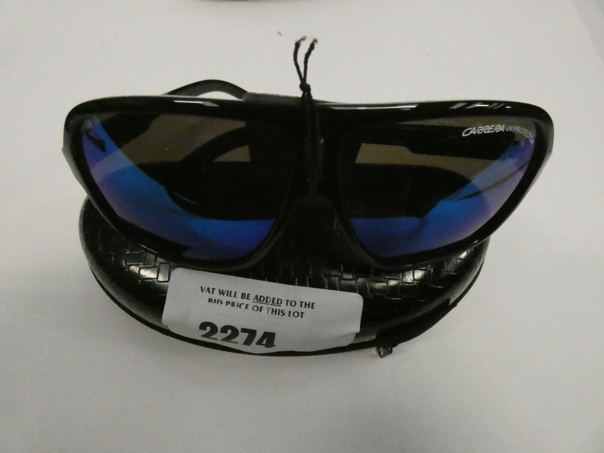 Pair of Carrera sunglasses in case